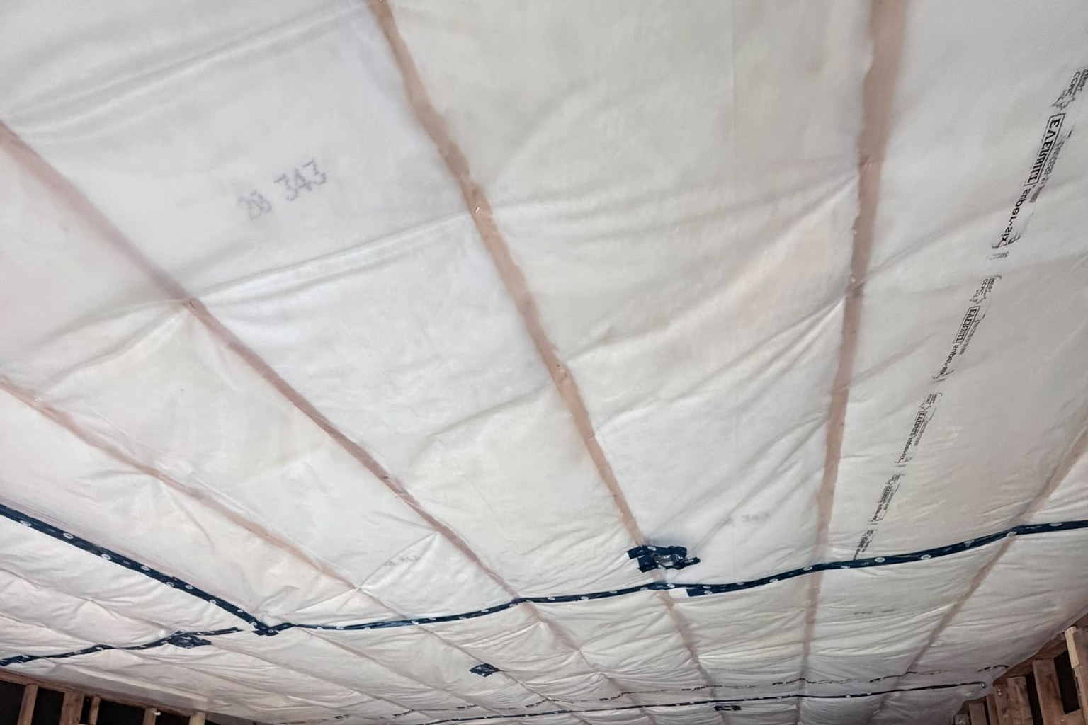 Ceiling fully covered in spray foam insulation