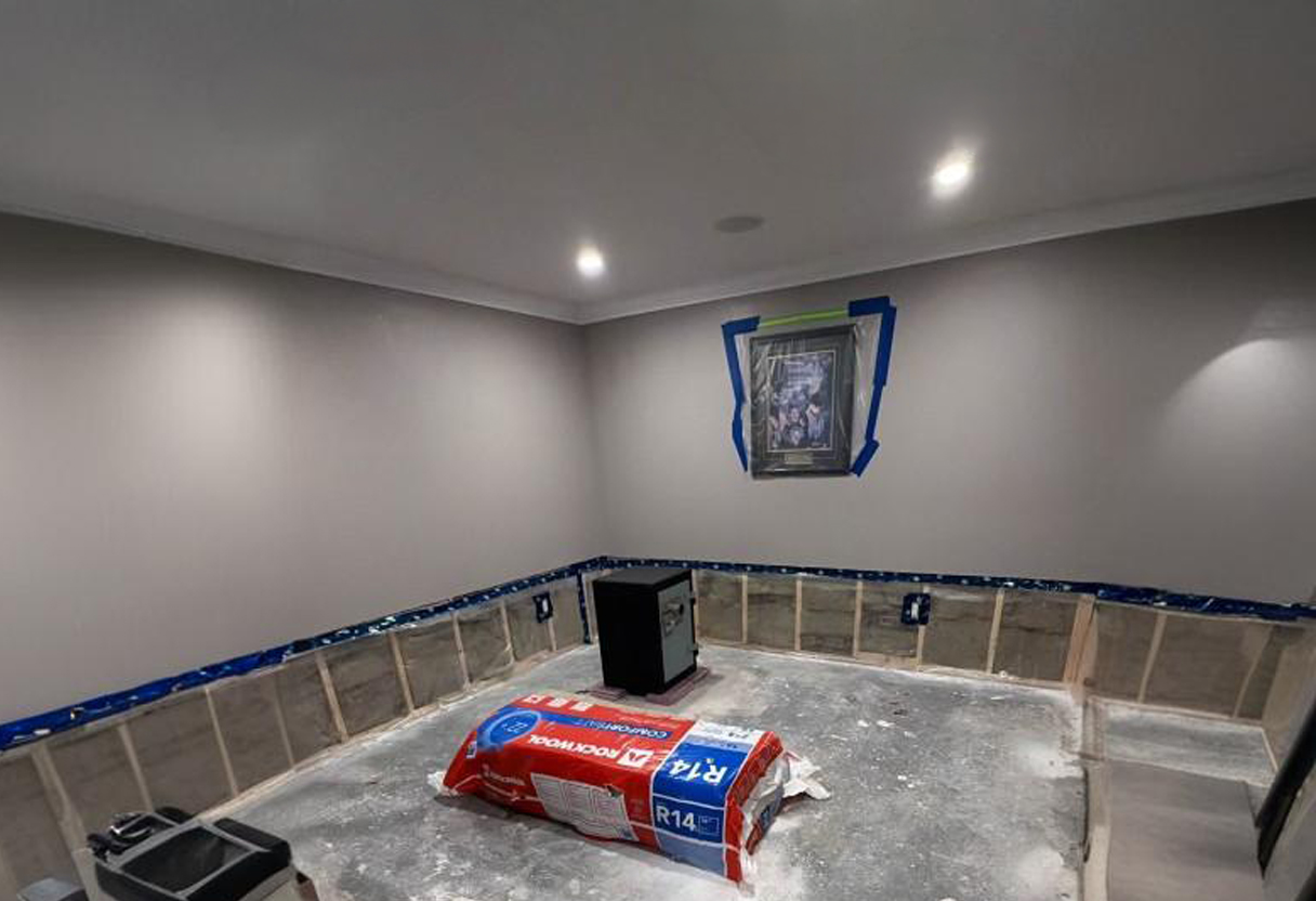 Basement room with freshly painted grey walls